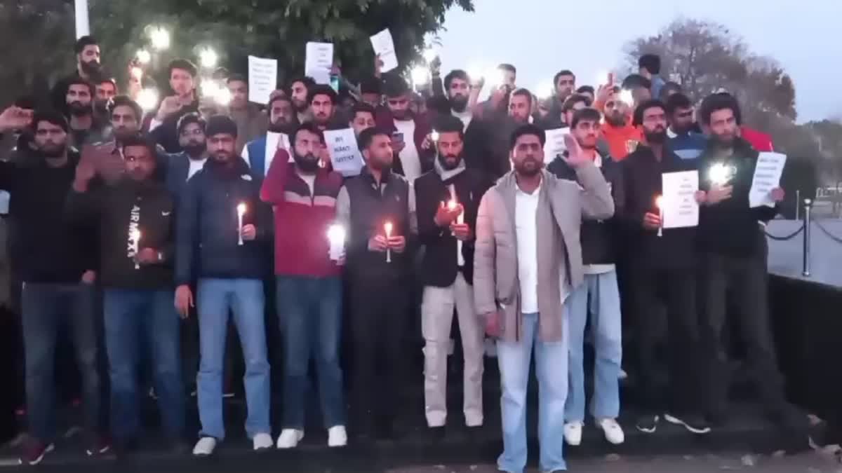 Candle march at Jammu University against 17 deaths in Rajouri Budhaal