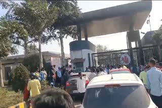 Locals protest outside the cement factory in Baloda Bazar