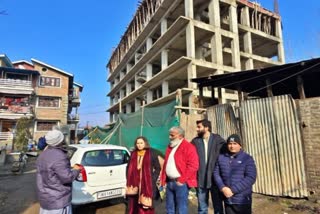 A JKRERA team inspecting a real estate site in Srinagar