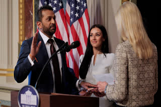 U.S. Attorney General Pam Bondi swears in the new Federal Bureau of Investigation Director Kash Patel as his girlfriend Alexis Wilkins holds the Bhagavad Gita in the Indian Treaty Room in the Eisenhower Executive Office Building on February 21, 2025 in Washington, DC.