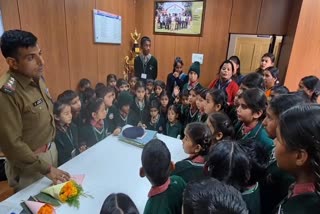 CHILDREN INSPECTED POLICE STATION