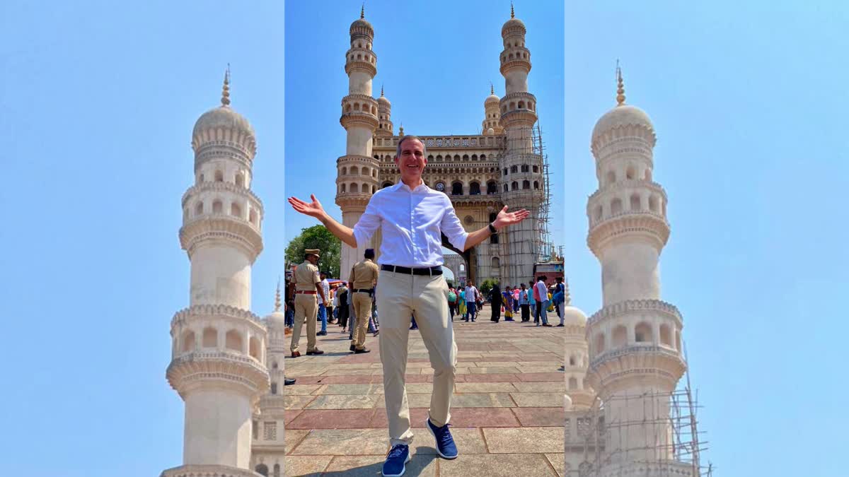 US Ambassador to India Eric Garcetti posing for a photograph at Charminar in Hyderabad