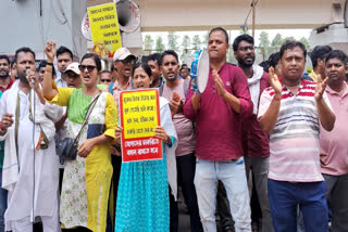Teaching and non-teaching staff stage a protest demanding restoration of their jobs