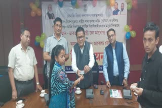 Ranoj Pegu Distributed Ayushman Bharat card