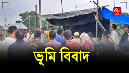 allegation against a woman of encroaching on land belonging to the Rangamati Cooperative Society in golaghat