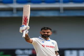 Virat Kohli celebrates his 29th hundred in the second Test against West Indies
