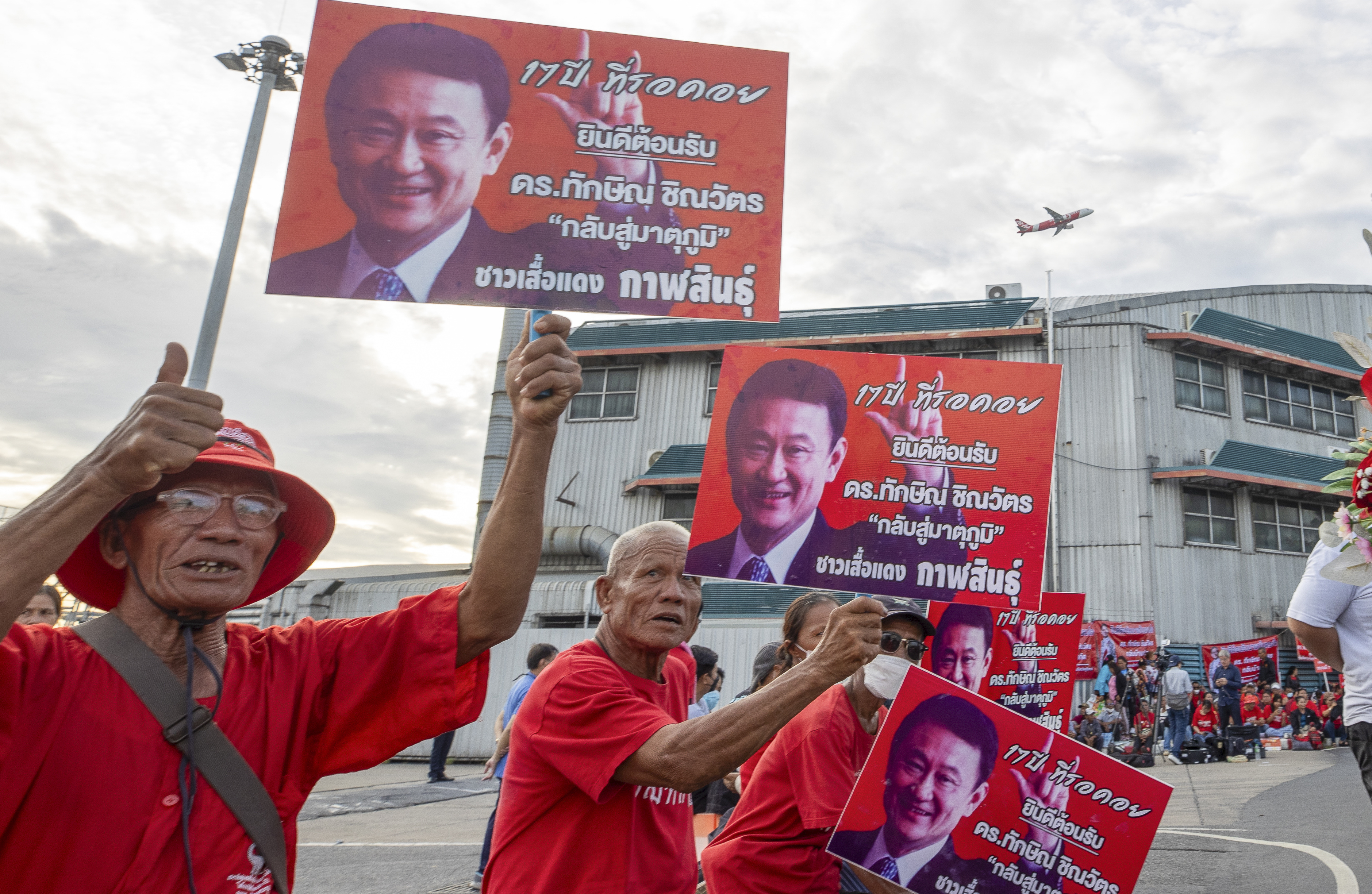 Divisive Shinawatra is expected to return to Thailand after years of self-imposed exile to face criminal charges on the same day that a party affiliated with him plans to start forming a new government.