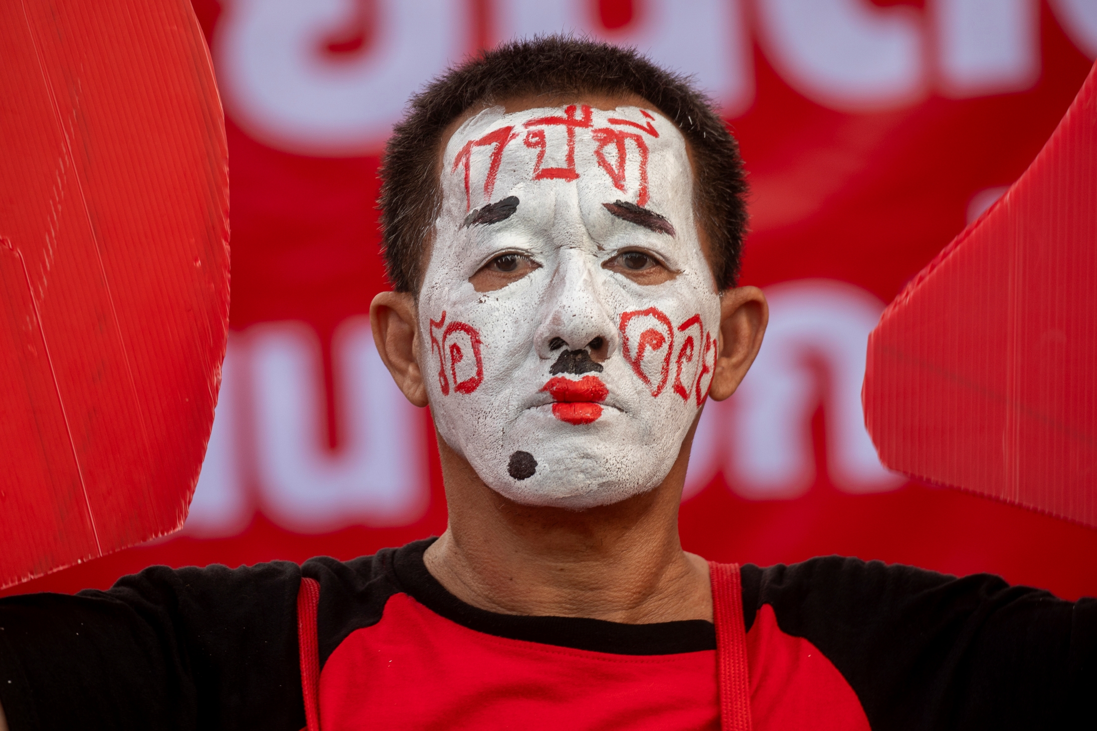 Divisive Shinawatra is expected to return to Thailand after years of self-imposed exile to face criminal charges on the same day that a party affiliated with him plans to start forming a new government.