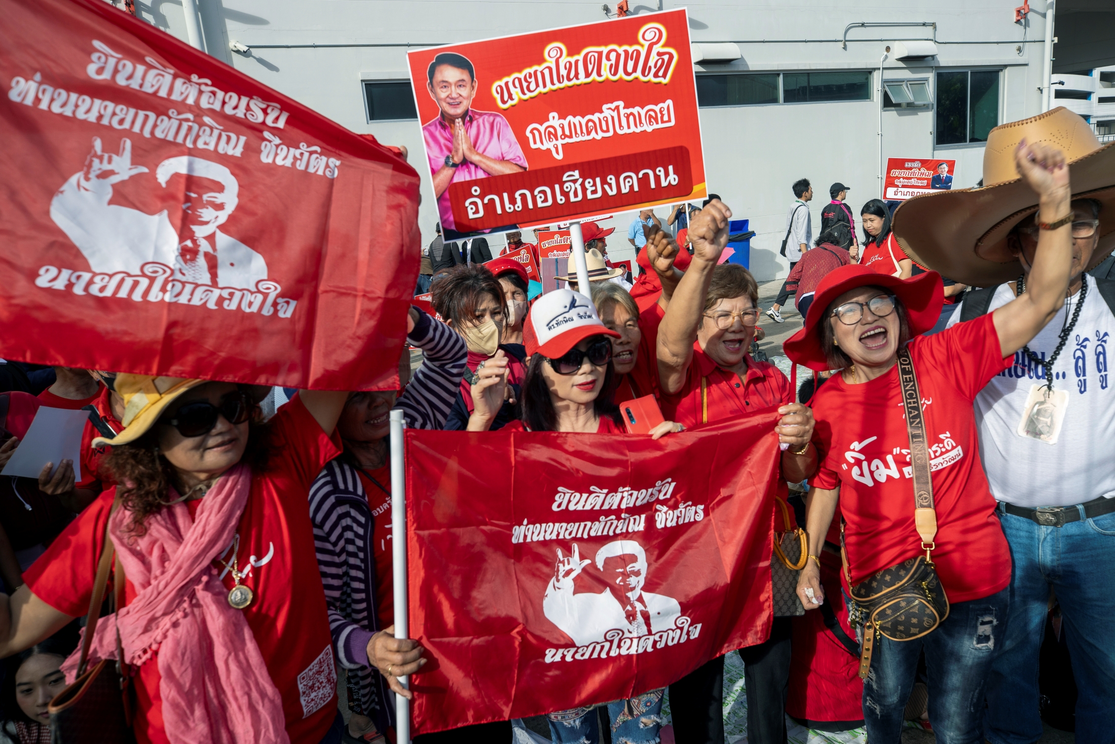 Divisive Shinawatra is expected to return to Thailand after years of self-imposed exile to face criminal charges on the same day that a party affiliated with him plans to start forming a new government.