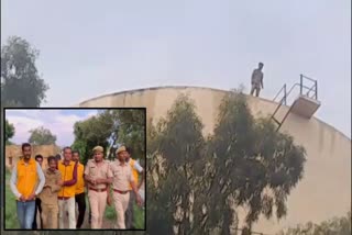 Man climbed on a tank