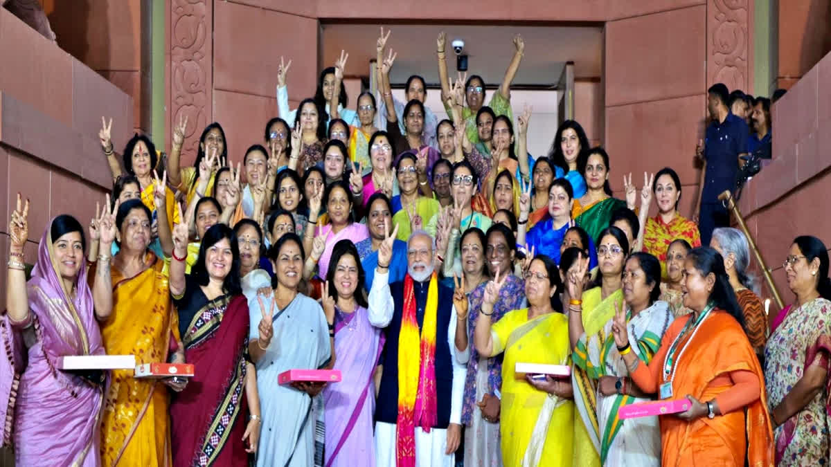 PM Modi celebrates passage of Women's Reservation Bill with female MPs ...