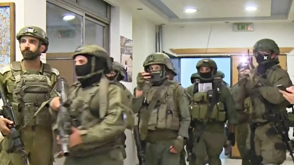 Israeli soldiers enter Al Jazeera office