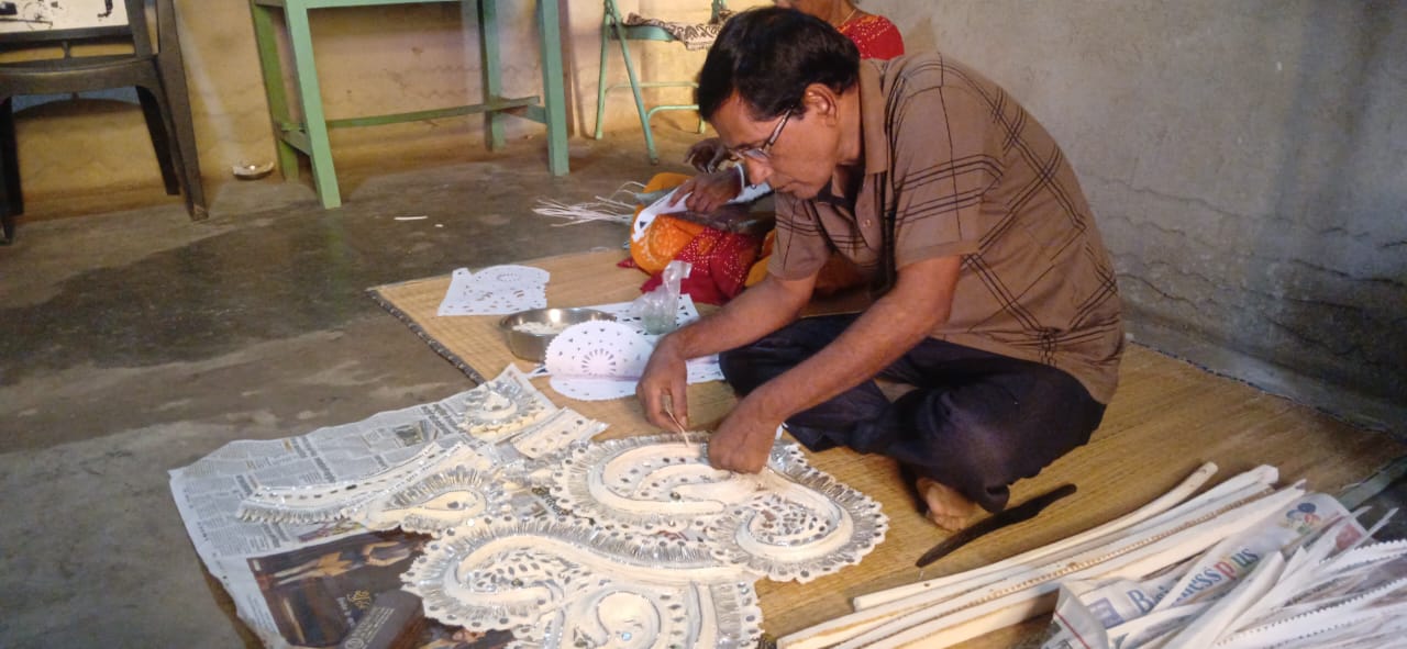 Shola Artist Preparation before Durga Puja