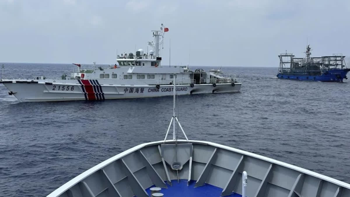 Philippines says a coast guard ship and supply boat are hit by Chinese vessels near disputed shoal