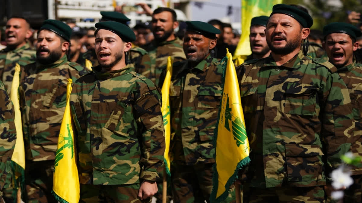 Hezbollah and Israel exchange fire and warnings of a widened war