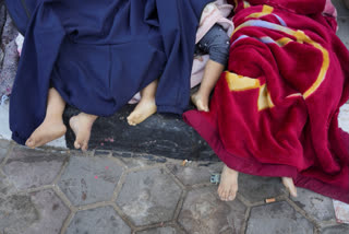 Bodies of Palestinian children killed in the Israeli bombardment of the Gaza Strip lie on the ground at Al-Aqsa Hospital in Deir Al-Balah, Sunday, Oct. 22, 2023. AP Photo/Hatem Moussa)