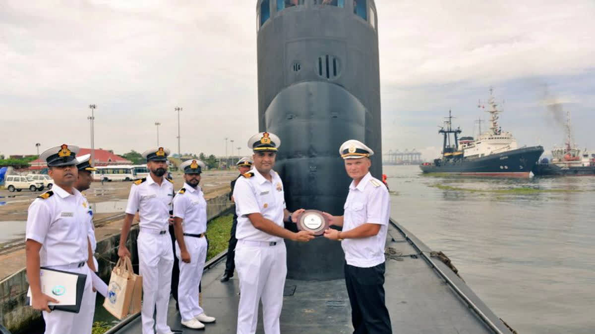 The Russian submarine Ufa docked in Kochi, receiving a warm welcome from the Indian Navy. symbolising maritime cooperation between India and Russia.