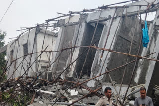 An under-construction building collapsed in Babusapally under the Hennur Police Station area in Bengaluru on Tuesday due to heavy rains.