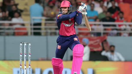 Rajasthan Royals' Tanush Kotian plays a shot during the IPL match between Punjab Kings and Rajasthan Royals