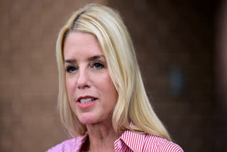 FILE - Pam Bondi, former Florida Attorney General, speaks to reporters outside an election integrity volunteer training, June 18, 2024, in Newtown, Pa.