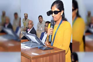 A Visually impaired woman reading with the help of KIMS Foundation's AI Glasses