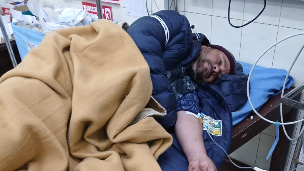 A mining department official undergoes treatment at a hospital after assaulted by mining mafia in Pulwama, Jammu and Kashmir