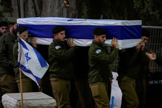 Israeli forces have killed 21 soldiers in the Gaza Strip, marking the deadliest attack on Israel since the October 7 Hamas raid. The military has encircled Khan Younis, Gaza's second largest city, where dozens of Palestinians have been killed and wounded. Prime Minister Benjamin Netanyahu has pledged to return over 100 hostages held captive in Gaza, but Israelis are divided on whether to do so.