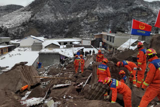 In this photo released by Xinhua News Agency, rescue workers search the site of a landslide in Liangshui village, Tangfang Town in the city of Zhaotong, southwestern China's Yunnan Province, Monday, Jan. 22, 2024. The landslide in southwestern China's mountainous Yunnan province early Monday buried dozens and forced the evacuation of hundreds. (Xinhua via AP)
