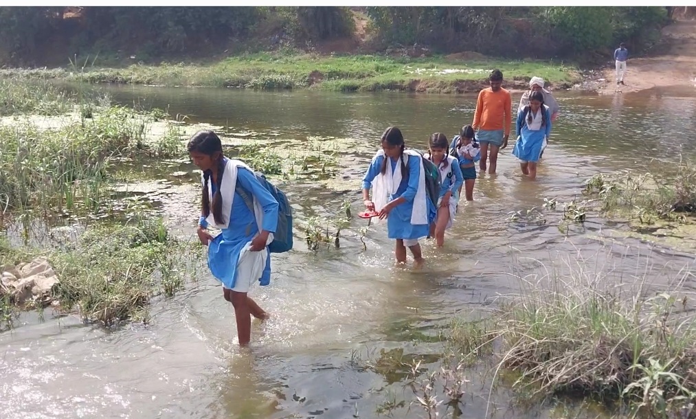 Students Cross River To Reach School