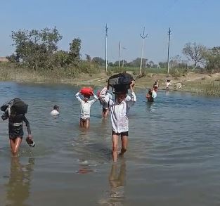 Students Cross River To Reach School