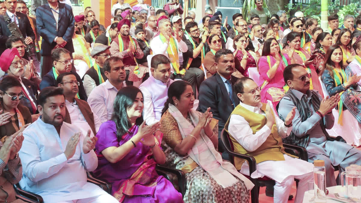 Union Minister JP Nadda and Delhi Chief Minister Rekha Gupta listen to Prime Minister Narendra Modi's 'Mann Ki Baat', in New Delhi, Sunday, Feb. 23, 2025.