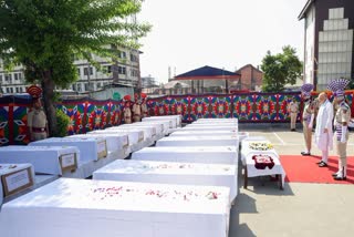 Home Minister Amit Shah pays last respects to the deceased in Srinagar on Wednesday.