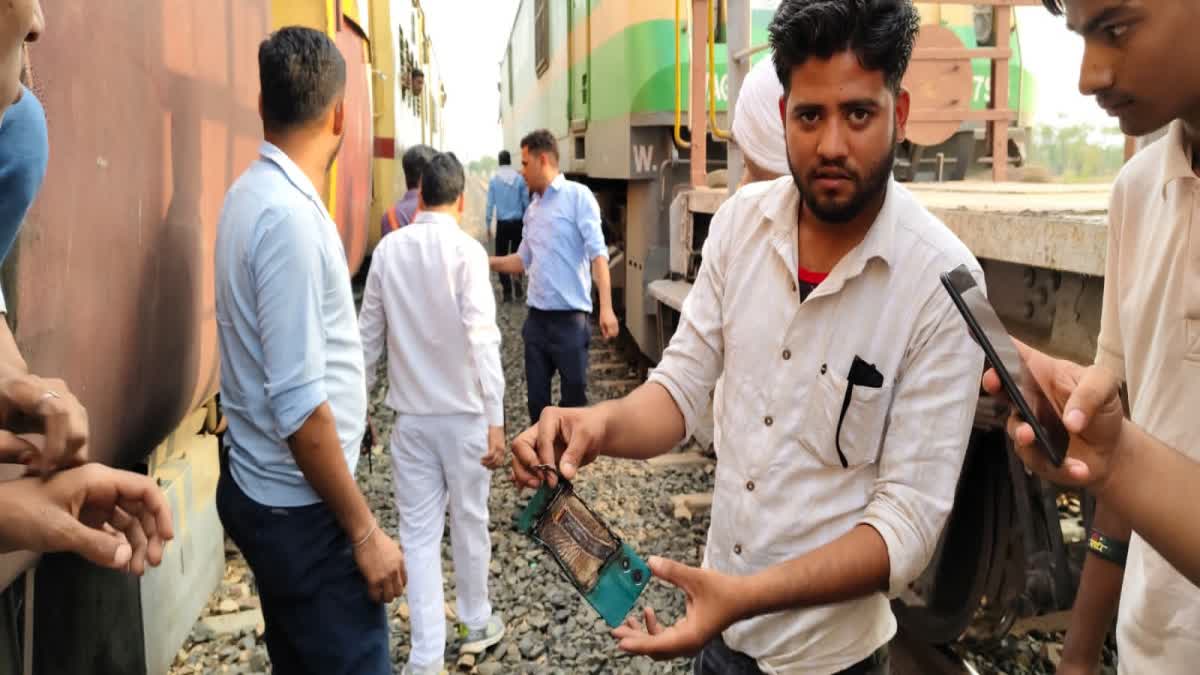 Mobile blast in passenger train