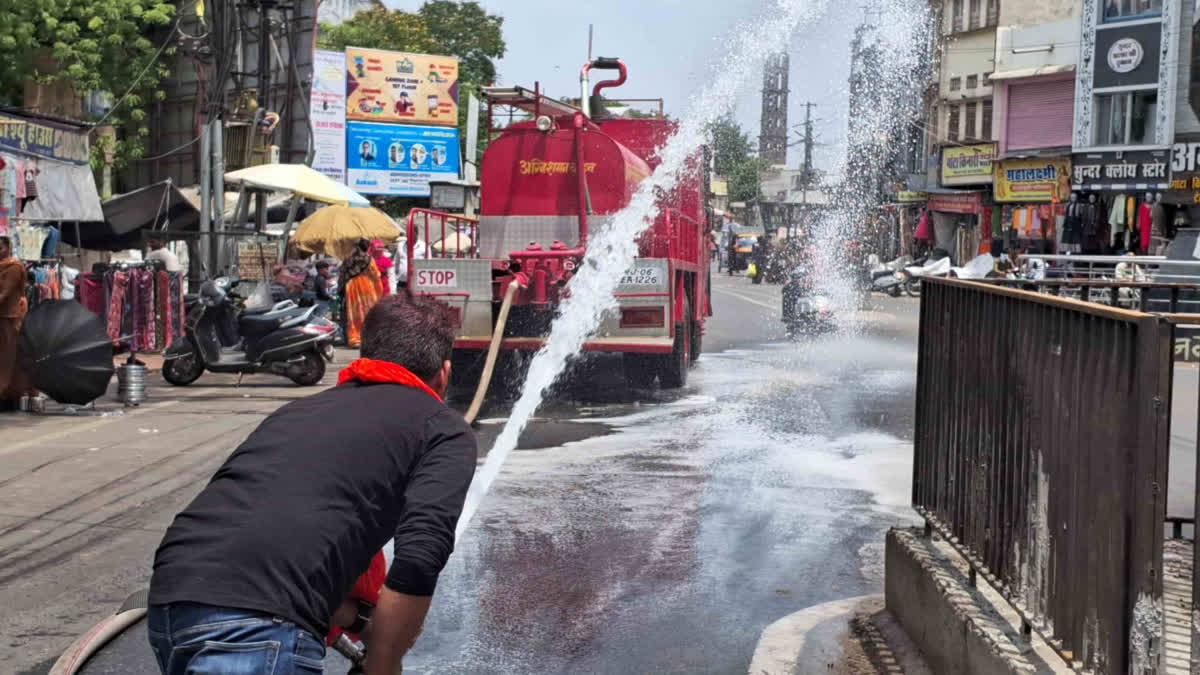 Water sprinkled on roads