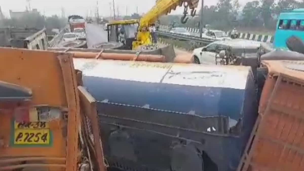 tanker full of black oil overturned