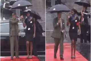 pakistan-pm-trolled-for-taking-umbrella-from-female-usher-she-gets-drenched-in-rain