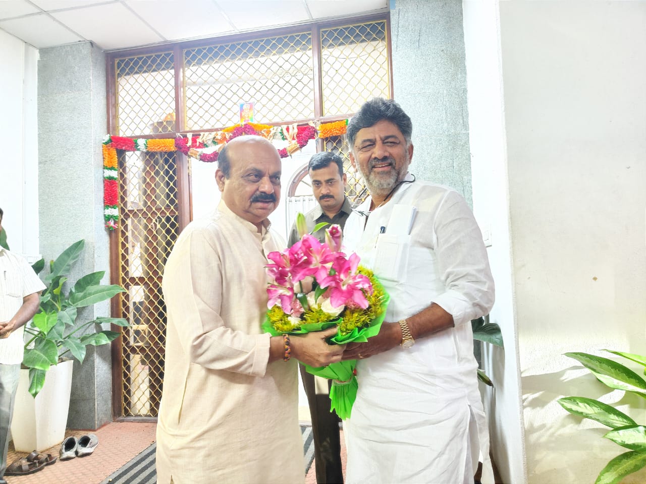 dcm DK Shivakumar met with former CM Basavaraj Bommai for bengaluru development