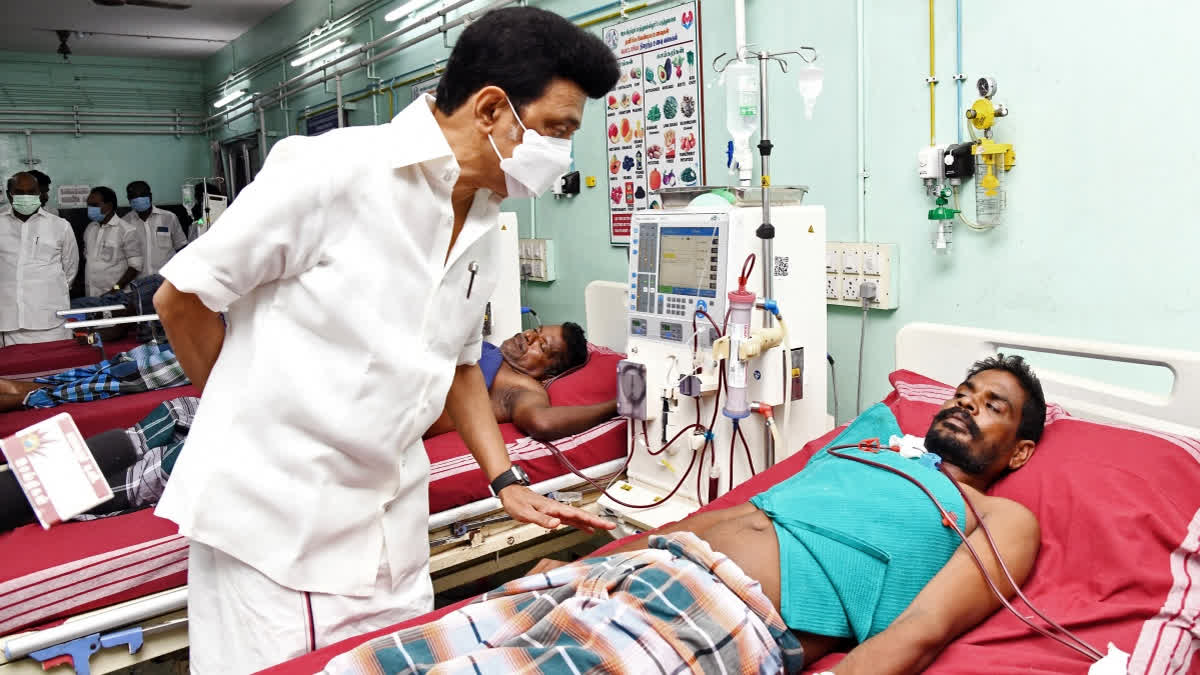 Tamil Nadu CM MK Stalin meets with a victim hospitalised at Mundyambakkam Government Medical College after consuming spurious liquor, in Villupuram on Monday.