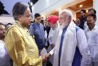 shashi tharoor and pm modi