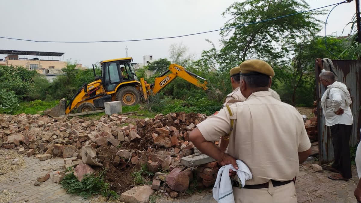 Encroachment on pond land demolished