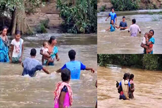 Agency People Crossing River in Bhadradri