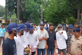NSUI workers arrived wearing cricket kit