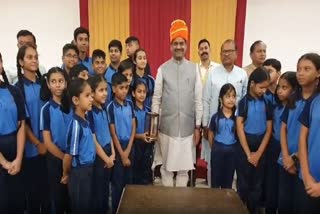 Children sing Ram stuti before speaker Om birla