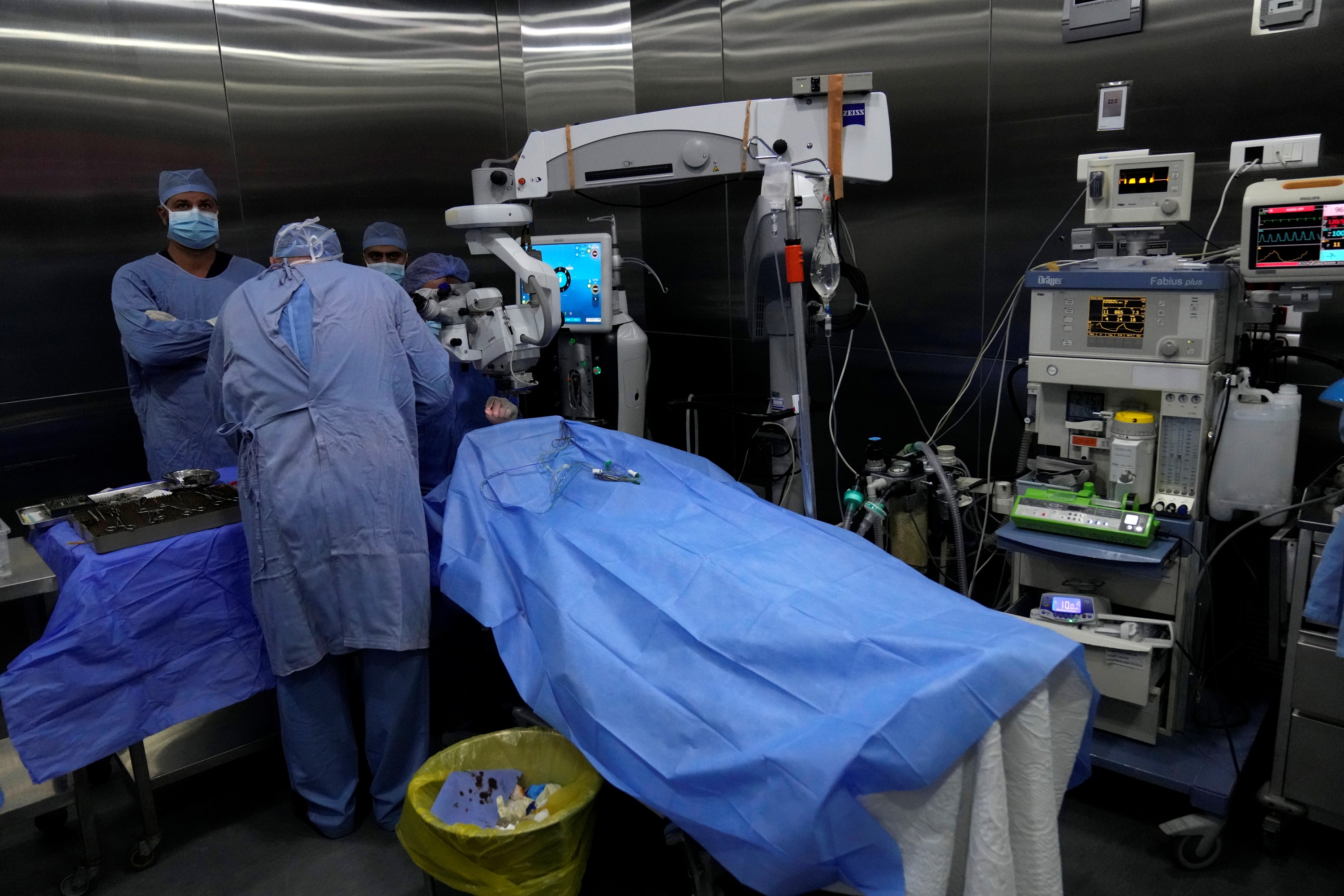 Doctors make an eye surgery operation on a man who was injured in the explosion of one of the handheld devices, at the Eye Specialist hospital, in Beirut, Lebanon, Friday, Sept. 20, 2024.