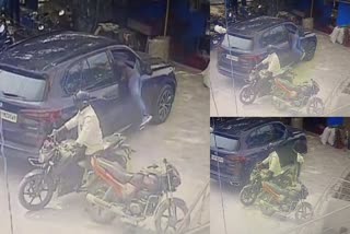 Man Breaks BMW Car Window And Stolen 14 Lakhs  Man Breaks BMW Car Window  Bengaluru news updtes  നിര്‍ത്തിയിട്ട കാറിന്‍റെ ചില്ല് തകര്‍ത്തു  14 ലക്ഷം കവര്‍ന്നു  ബിഎംഡബ്ല്യൂ കാറിന്‍റെ ചില്ല് തകര്‍ത്ത്  സബ്‌ രജിസ്ട്രാര്‍ ഓഫിസ്