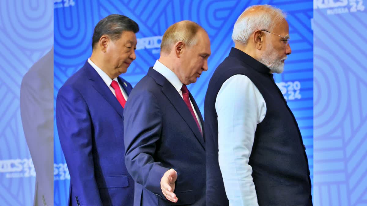 From left, Indian Prime Minister Narendra Modi, Russian President Vladimir Putin and Chinese President Xi Jinping attend a family photo ceremony prior to the BRICS Summit plenary session in Kazan, Russia, Wednesday, Oct. 23, 2024.