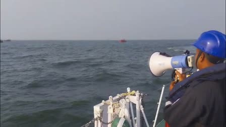 An ICG official during preparations ahead of the landfall of cyclone Dana.