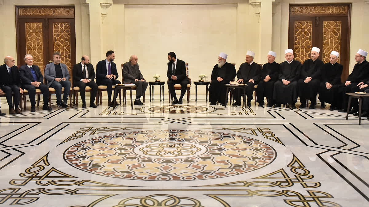 Walid Jumblatt, the Druze former leader of Lebanon's Progressive Socialist Party (PSP), and his son and current party head Taymur Jumblatt meet with Syrian leader Ahmed al-Sharaa, interim prime minister Mohammad al-Bashir, and other Druze leaders during a visit to Damascus on December 22, 2024.