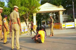a man protest for cutting hand by blade in front of Tirunelveli Collectorate Office