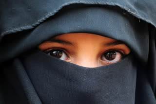 A head constable was suspended on Thursday for harassing a woman and asking her to remove her Burqa as it hid 'her beautiful face.